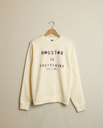 Dessert Gallery Houston is Everything Crewneck Sweatshirt (Cream/Purple)